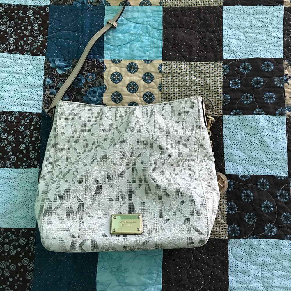 Michael Kors cross body purse and matching wallet